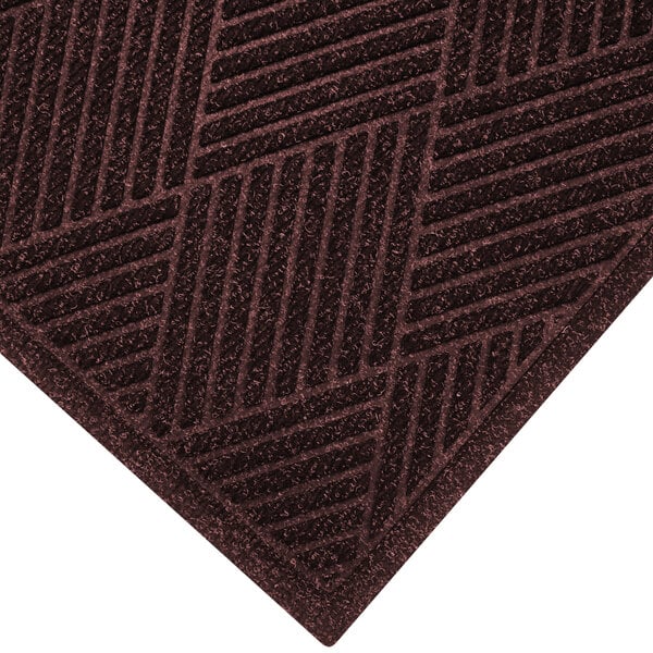 A maroon WaterHog Eco Premier mat with a patterned border.