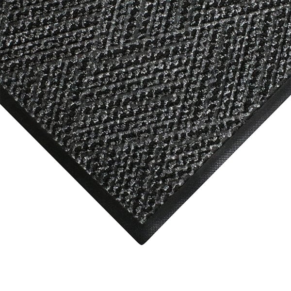 A black WaterHog doormat with a black border and grey diamond pattern.