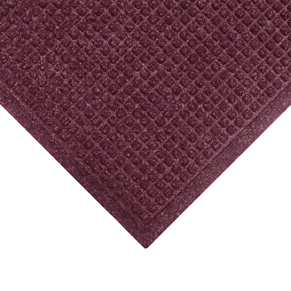 A M+A Matting WaterHog entrance mat with a square pattern and a burgundy border.