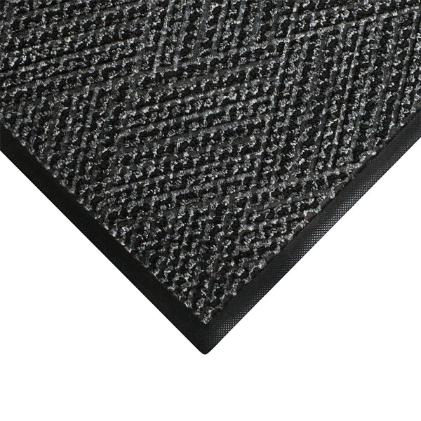 A black WaterHog Diamondcord doormat with a black border.
