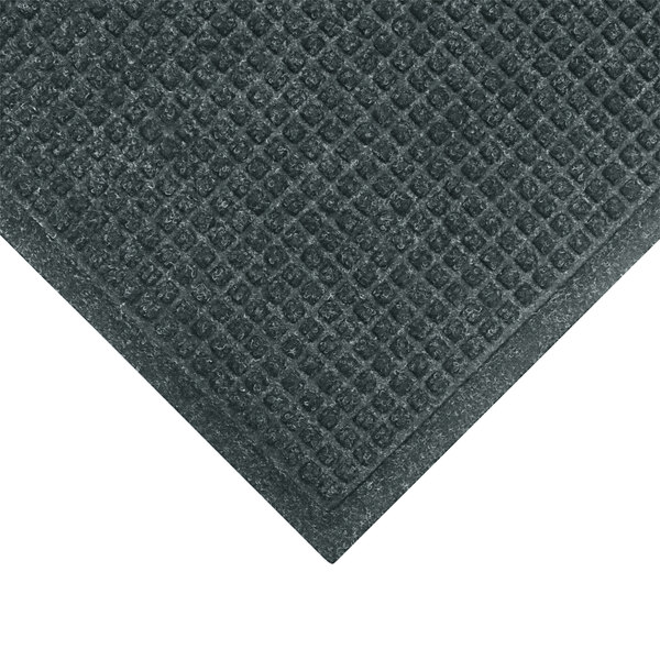 A close up of a WaterHog Bluestone mat with a square pattern.