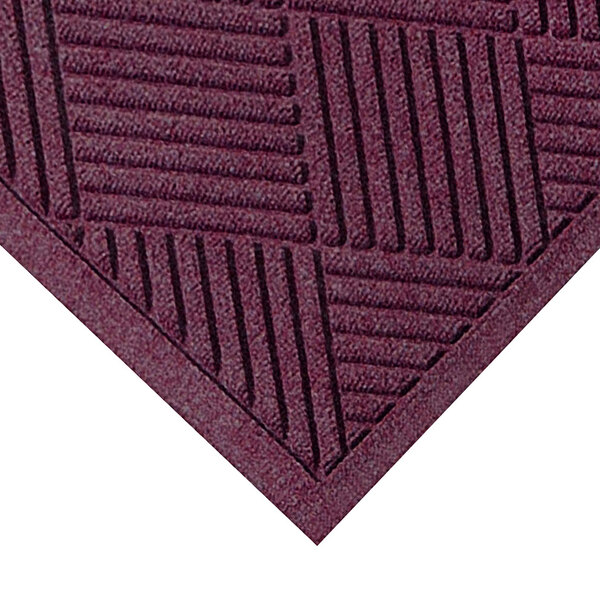 A M+A Matting WaterHog Diamond Fashion mat with a burgundy border decorated with squares.