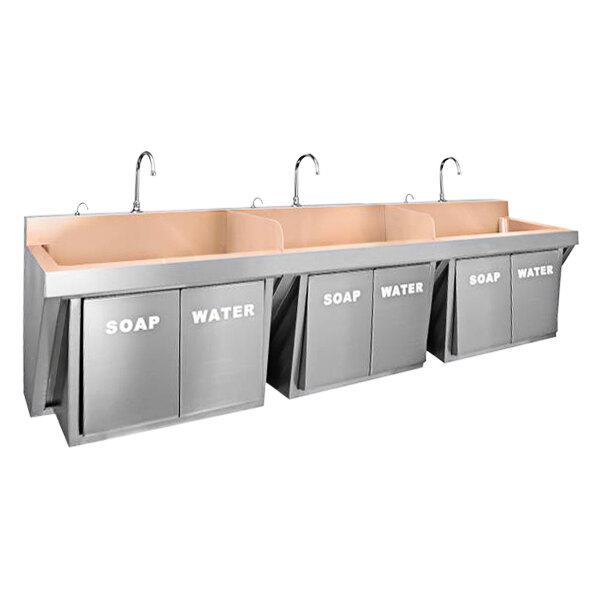 A Just Manufacturing copper wall-hung triple bowl scrub sink with knee operated faucets and soap valves.