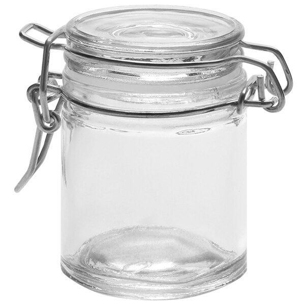 An American Metalcraft miniature clear glass apothecary jar with a metal lid.
