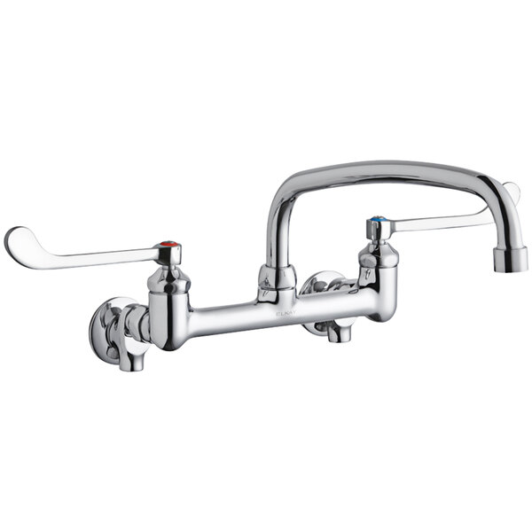 A chrome Elkay wall-mounted faucet with two wristblade handles and an arc tube swing spout.