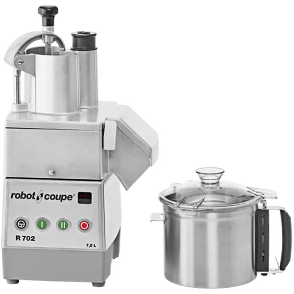 A Robot Coupe combination food processor with 2 small bowls and a lid.