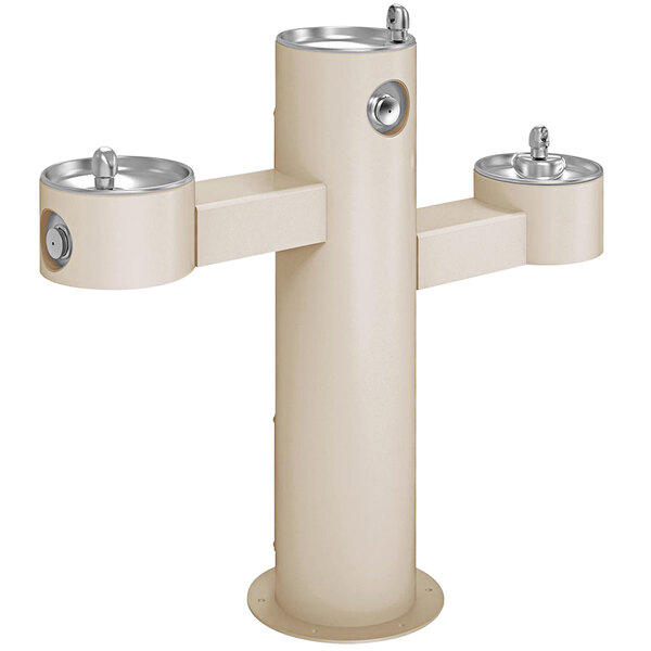A beige Halsey Taylor outdoor tri-level pedestal drinking fountain with three fountains.