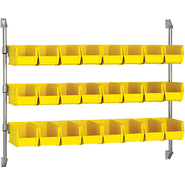 A Quantum wall mount with yellow divider bins on metal shelves.