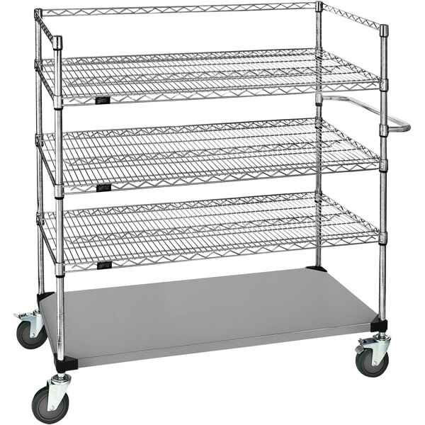 A Quantum stainless steel medical cart with 3 wire shelves and 1 steel shelf on wheels.