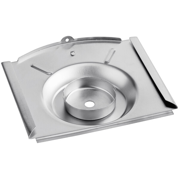 A stainless steel metal plate with a round hole.
