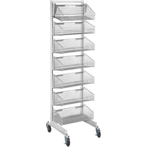 A chrome Quantum metal partition wall rack with baskets on wheels.