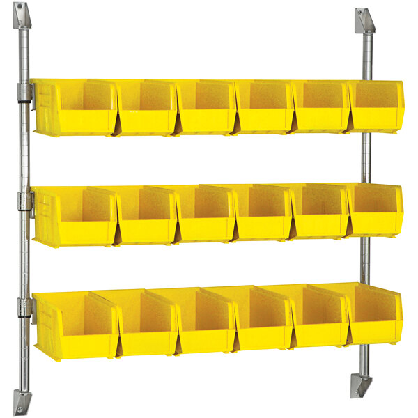 A Quantum wall mount with yellow bins containing dividers.