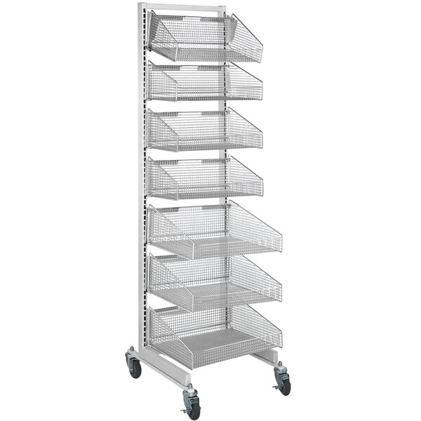 A Quantum chrome merchandiser rack with hanging baskets on wheels.