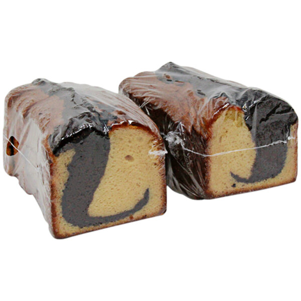 Two loaves of Sweet Sam's Marble Pound Cake wrapped in plastic.
