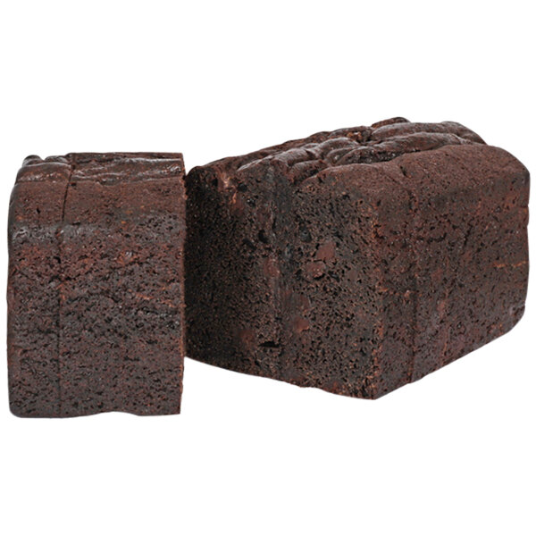 A piece of Sweet Sam's double chocolate pound cake with a slice cut off.