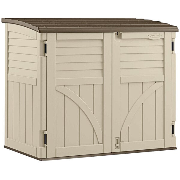 A tan Suncast horizontal storage shed with brown trim.
