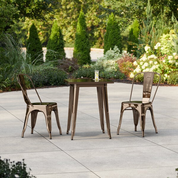 Lancaster Table & Seating Alloy Series 23 1/2" x 23 1/2" Copper Standard Height Outdoor Table with 2 Cafe Chairs