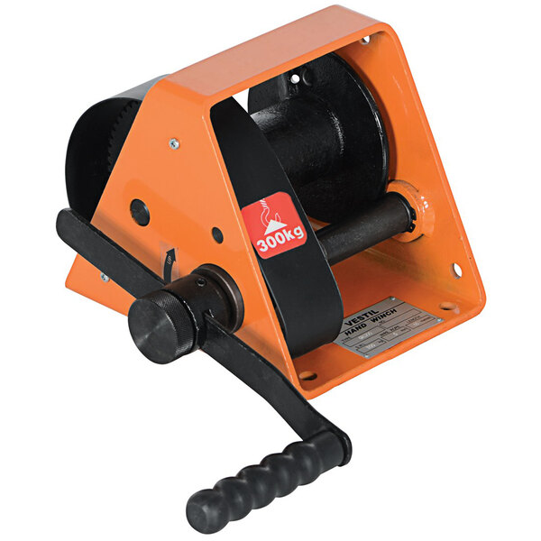 A Vestil steel gear hand winch with an orange and black handle.