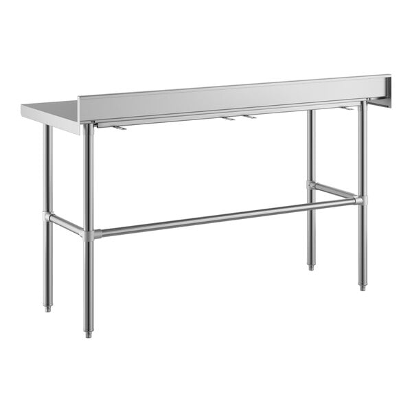 A stainless steel work table with an open base, four legs, and a 4-inch backsplash along the back edge.