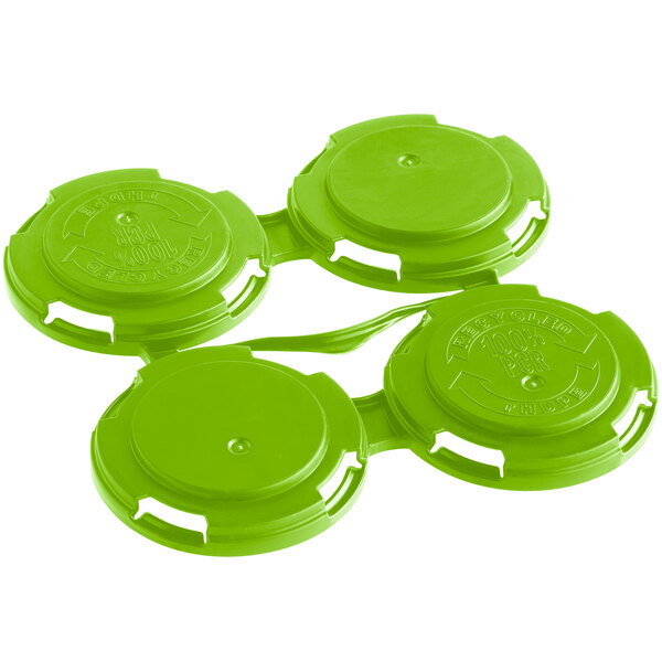A green plastic PakTech can carrier with four circles.