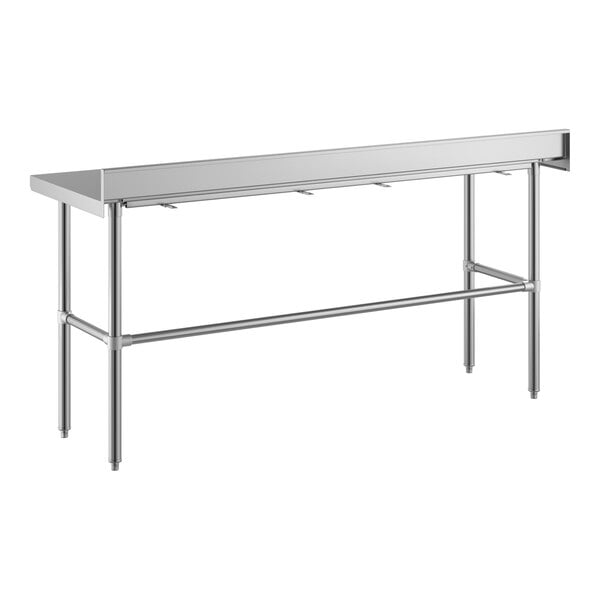 A stainless steel work table with an open base, four legs, and a 4-inch backsplash along the back edge.