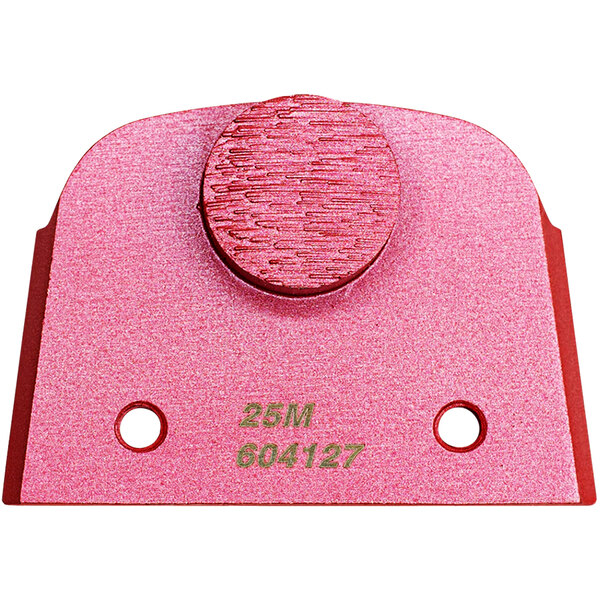 A pink metal tool with a red circle and holes.