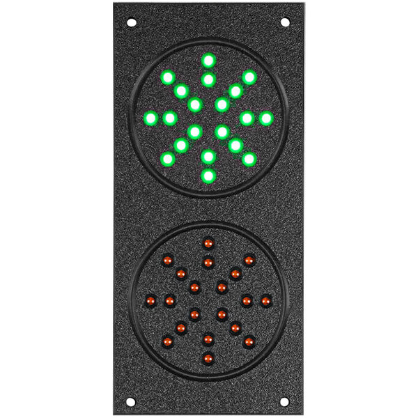 A black rectangular traffic light with green and red lights.