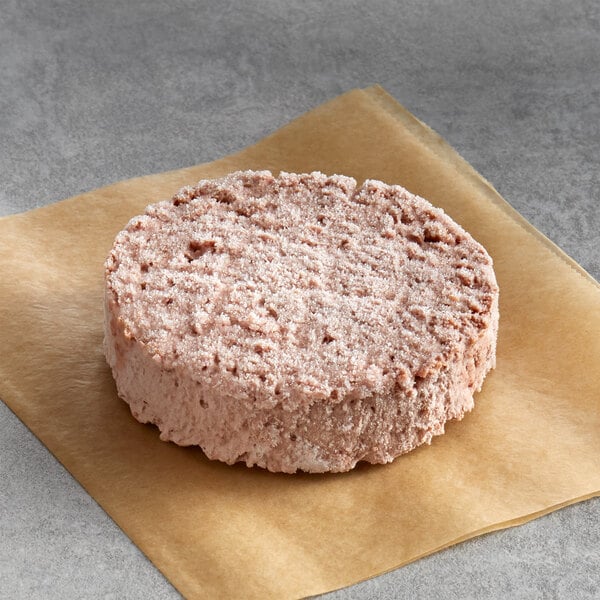 A Beyond Meat plant-based burger patty on a white background.