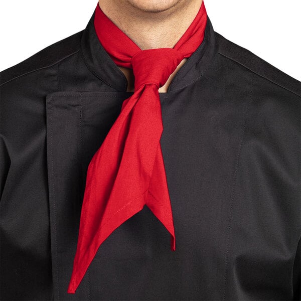 A man wearing a red Uncommon Chef neckerchief around his neck.