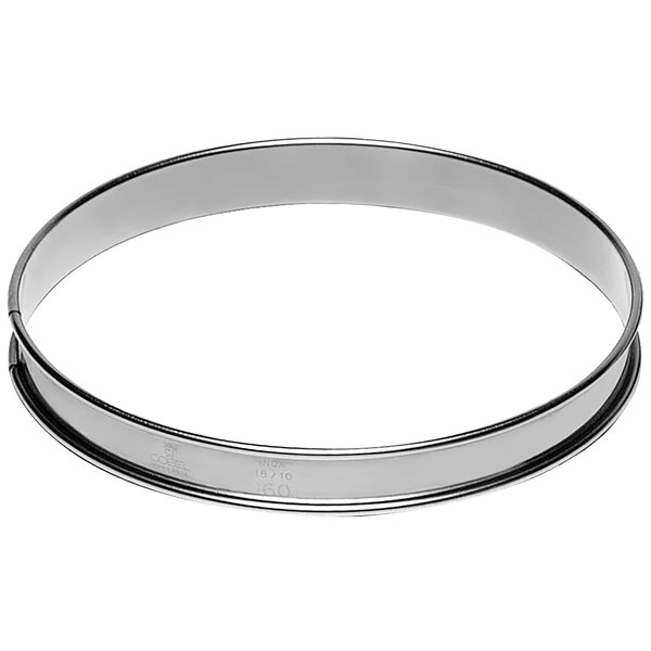 A Gobel stainless steel round tart ring with a circular design.