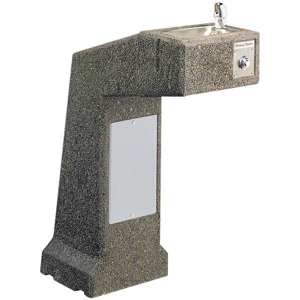 A Halsey Taylor Sierra Stone pedestal drinking fountain with a silver faucet.