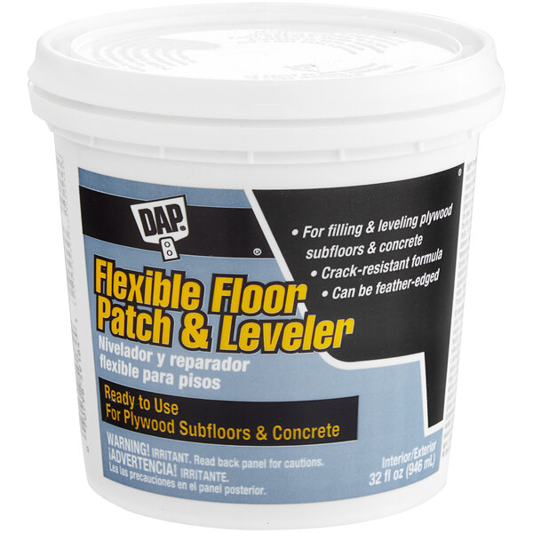 A white container of DAP Light Gray Flexible Floor Patch and Leveler with a blue label.