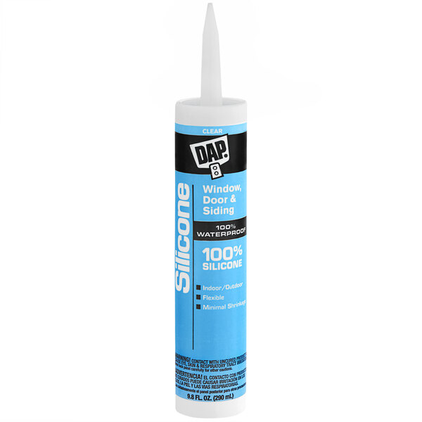 A white and blue tube of DAP Clear Silicone Rubber Sealant.