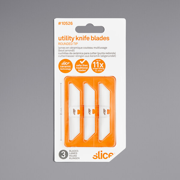 A package of Slice utility knife blades with orange packaging.
