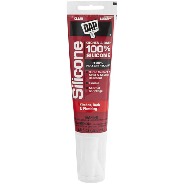 A red tube of DAP Clear Silicone Rubber Sealant with white text.