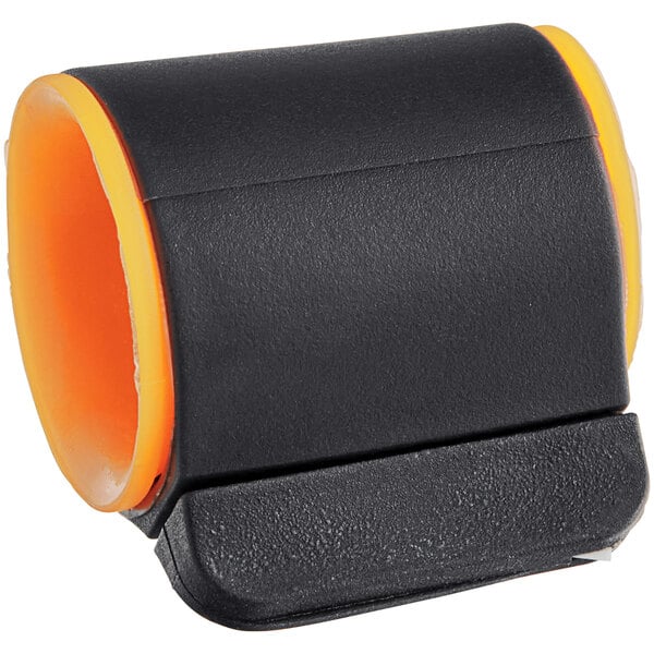 A black and orange Slice Safety Cutter ring.