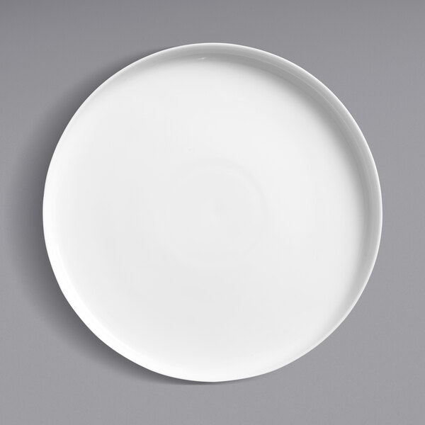 A white Oneida Scandi porcelain plate with a raised rim on a white surface.