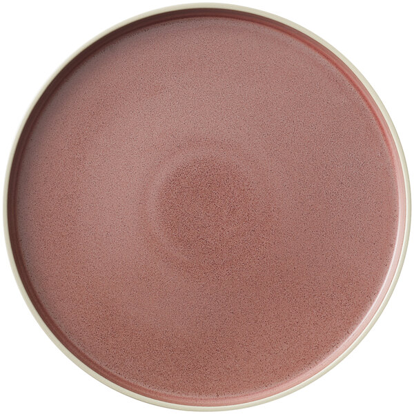 A smoky plum stoneware plate with a white rim.