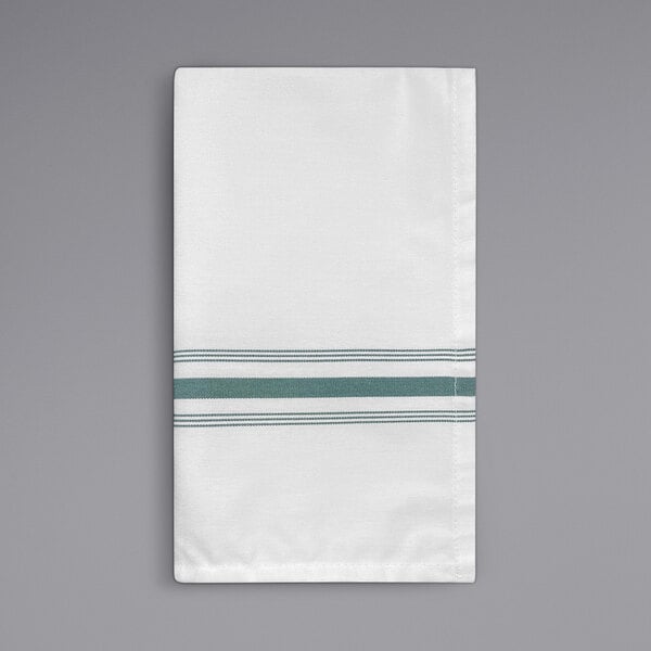 A white cloth napkin with green stripes.