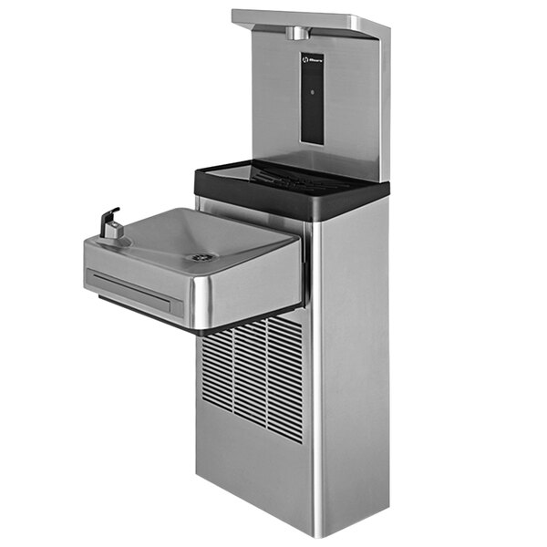A close-up of a stainless steel water fountain with a water faucet.