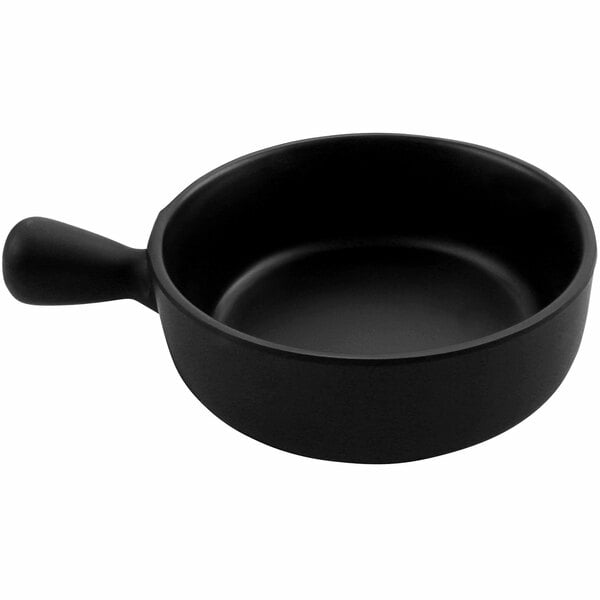 A black bowl with a handle.