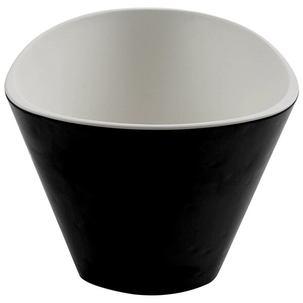 A black cheforward melamine bowl with a white rim.