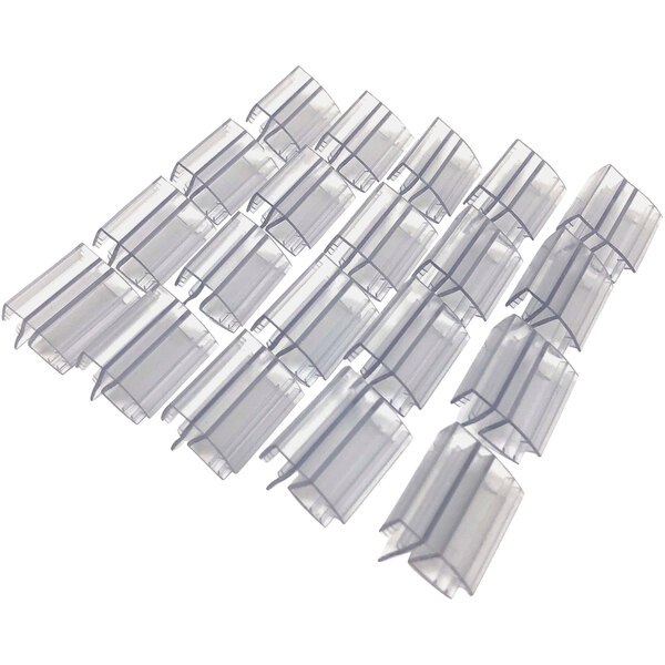 A group of clear plastic clips.