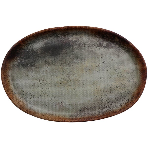 A white cheforward melamine oval plate with a woven design.
