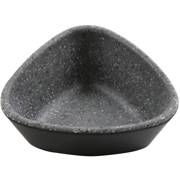 A black and grey triangle shaped cheforward ramekin with a grey speckled surface.