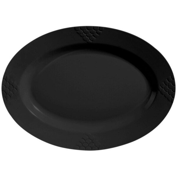A black oval melamine platter with a design on it.