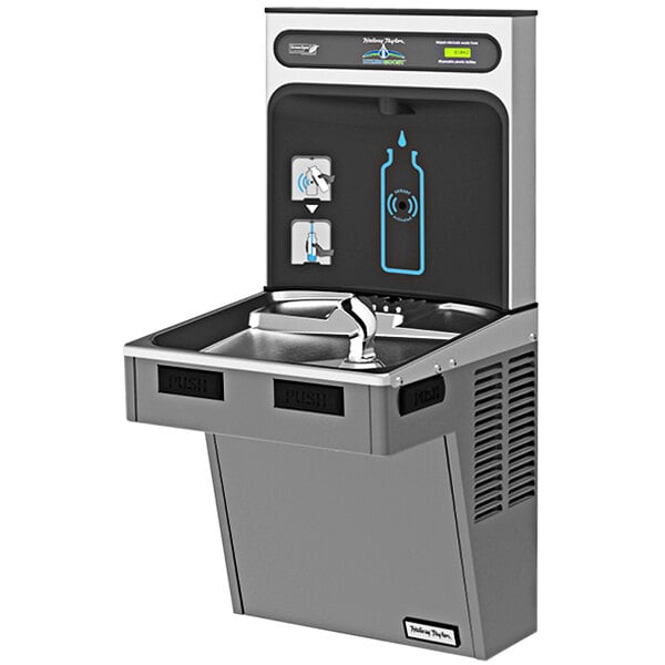 A Halsey Taylor HydroBoost water fountain and bottle filler with a drink bottle on the counter.