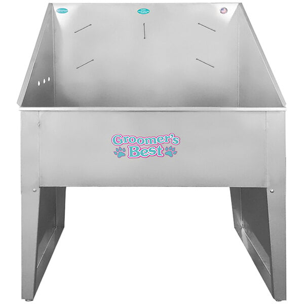 A stainless steel Groomer's Best bathing tub with a logo on it.