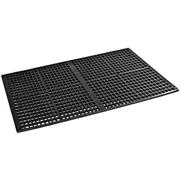 A black plastic floor grate with holes.