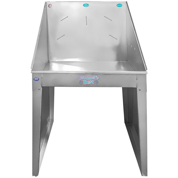 A silver metal Groomer's Best stainless steel dog bathing tub with a blue seat.